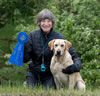 Merganser's Chief Mahomes (QAA) and Dianne with a 1st place finish at the Shasta Cascade Retriever Club Field Trial, Junction City, OR on May 2, 2025.